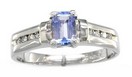 LDS E/C TANZANITE RING W/CHANNEL SID