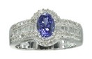 LDS OV  TANZANITE RING W/BAGUETTES &