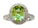 LDS OVAL PERIDOT AND DIAMOND RING