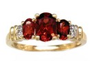 LDS 3 STONE OV GARNET & 2 DIA RING