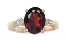 LDS OVAL GARNET RING W/DIA ACCENTS