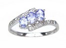 LDS 3 OV TANZANITE & DIAMOND RING